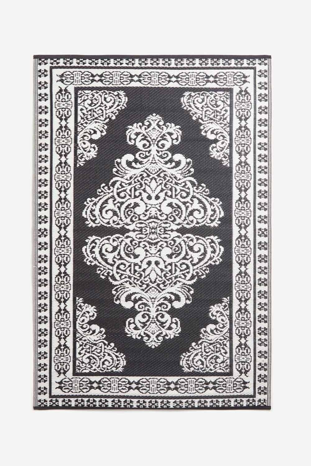 White Motif Design Reversible Outdoor Rug