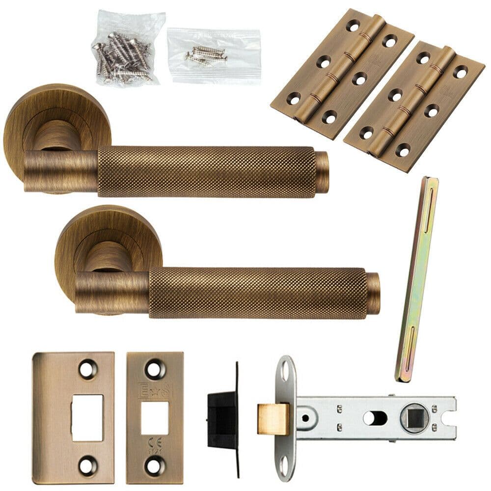 Door Handle & Latch Pack Antique Brass Knurled Round Bar Screwless Round