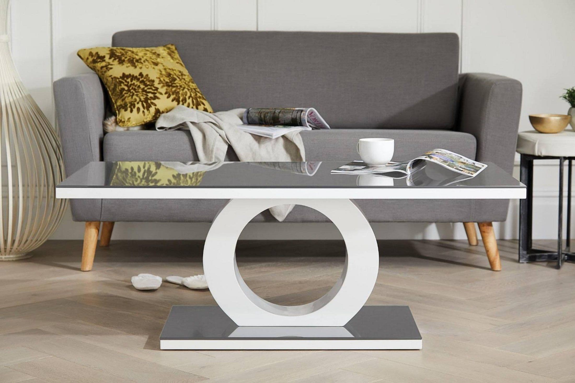 Giovani Rectangular High Gloss Coffee Table Glass Top Unique Halo Structural Plinth Base Design