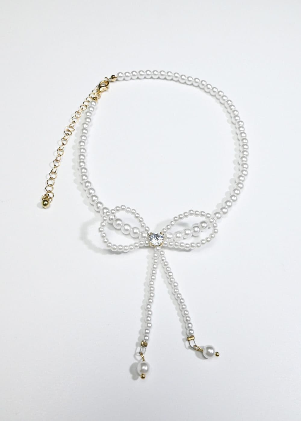 Madein Women's Ivory Bow Beaded Necklace in White